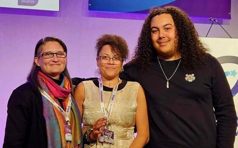 Group of three people winning award Jeannine Burke Be Part of Change