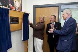 yn Goggins unveils plaque with Mike Kane MP and Eddy Newman, Chair of WCHG