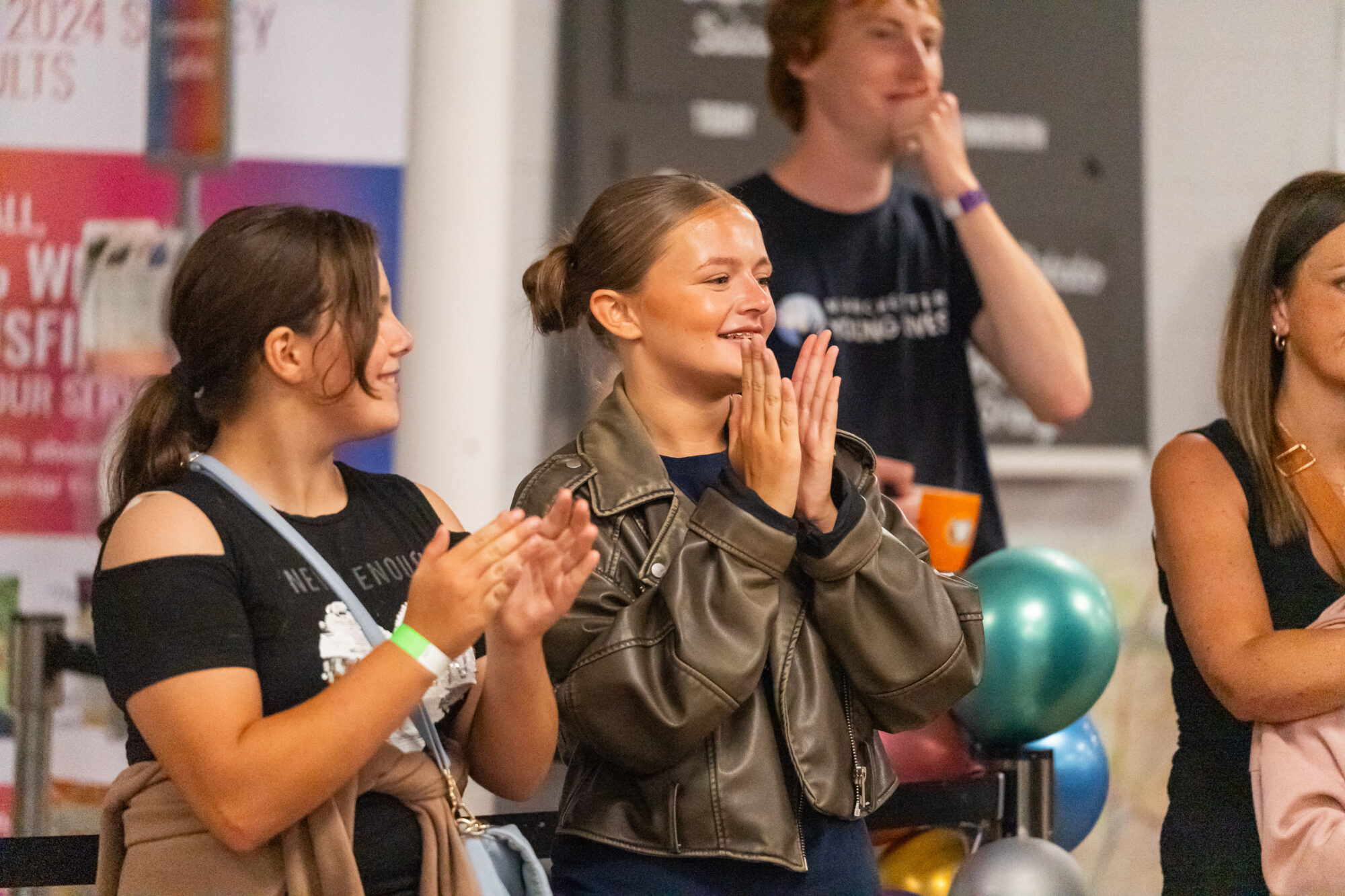 Young people clapping at Youth Connect '25