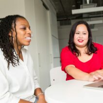 Two women learning how to get online